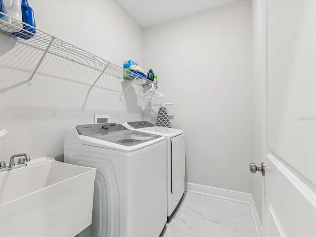 a bathroom with a sink and vanity