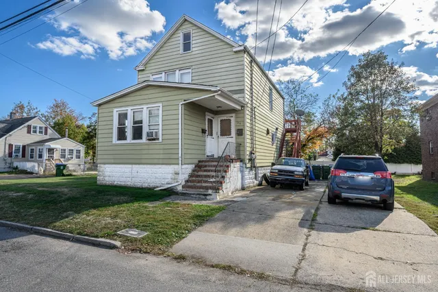 a house view with a garden space