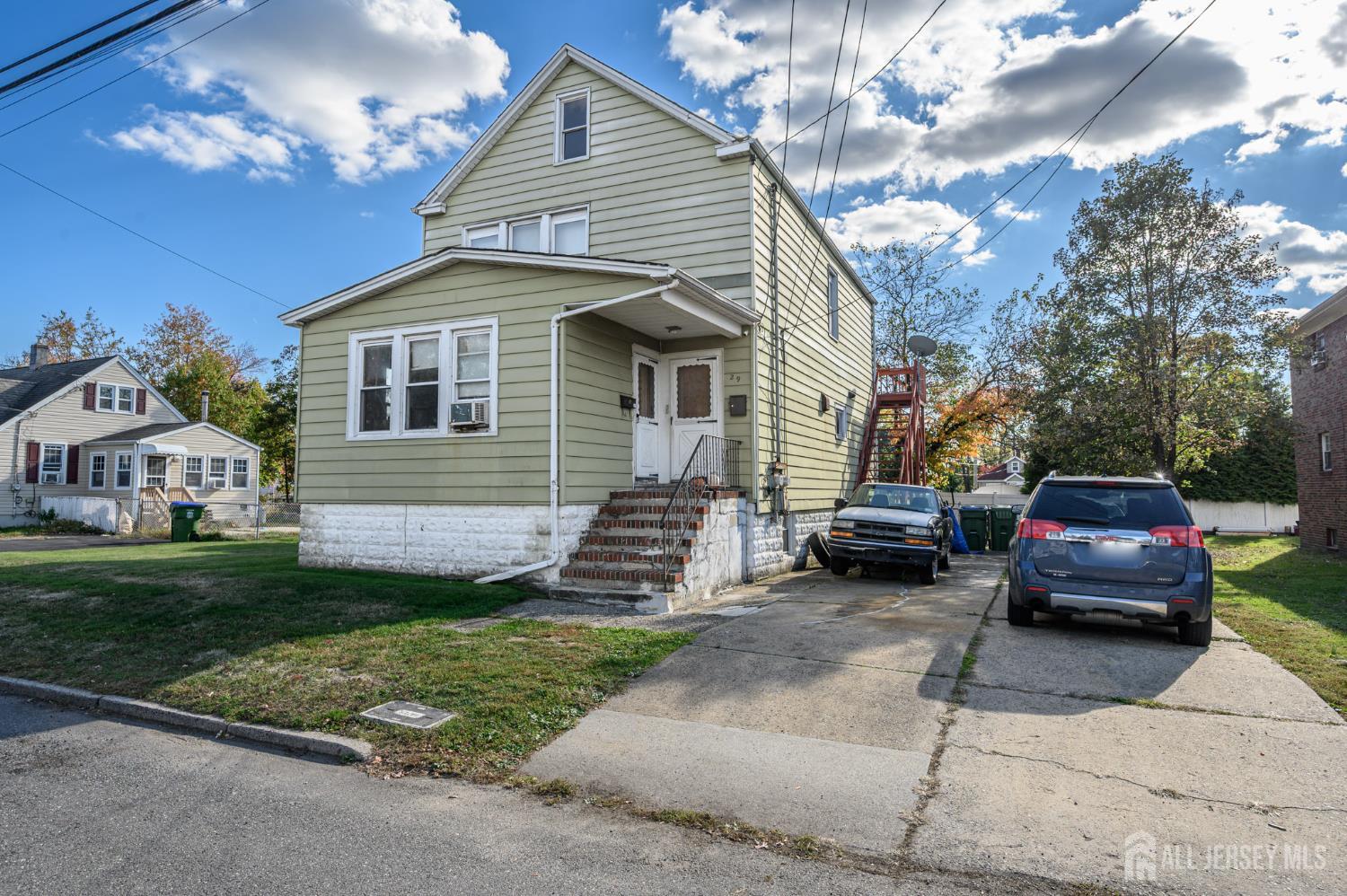 a house view with a garden space