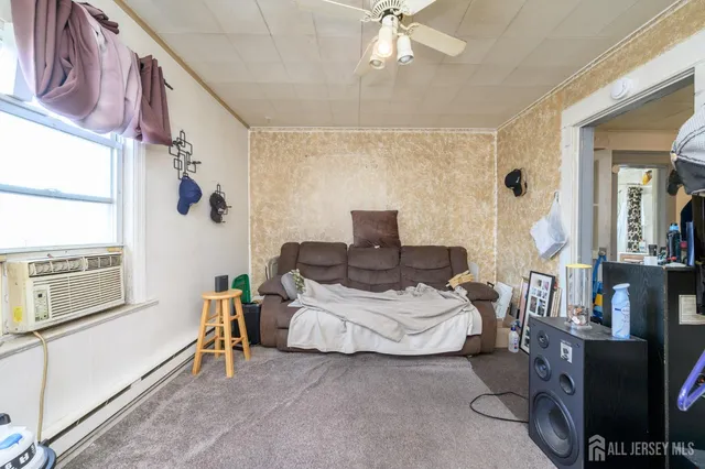 a bathroom with a sink toilet vanity and bathtub
