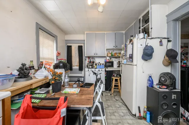 a room with furniture and wooden floor