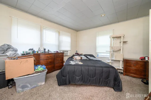 a view of a chairs and table in backyard of the house
