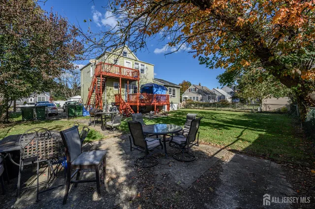 an aerial view of a city with mountains