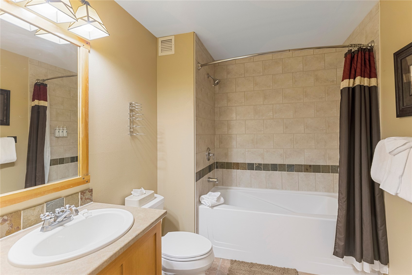 910 Copper Road, Unit 219 Copper Mountain, CO 80443 - Photo 22 of 35 a bathroom with a sink toilet and shower