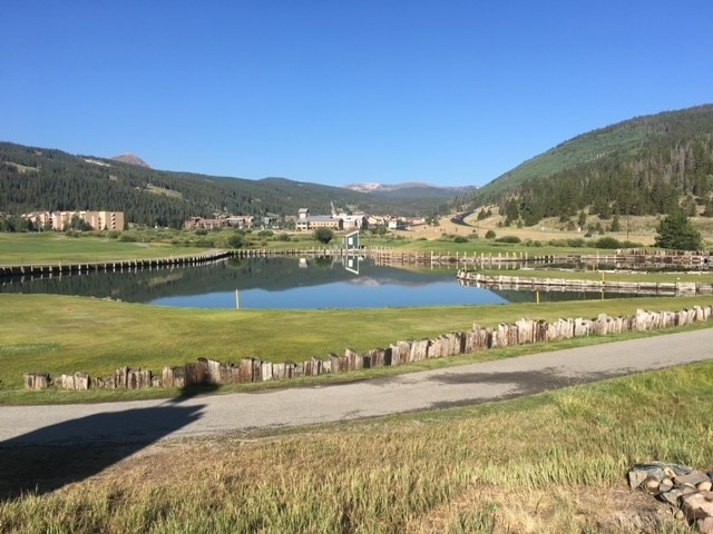 910 Copper Road, Unit 219 Copper Mountain, CO 80443 - Photo 33 of 35 a view of an ocean with a mountain