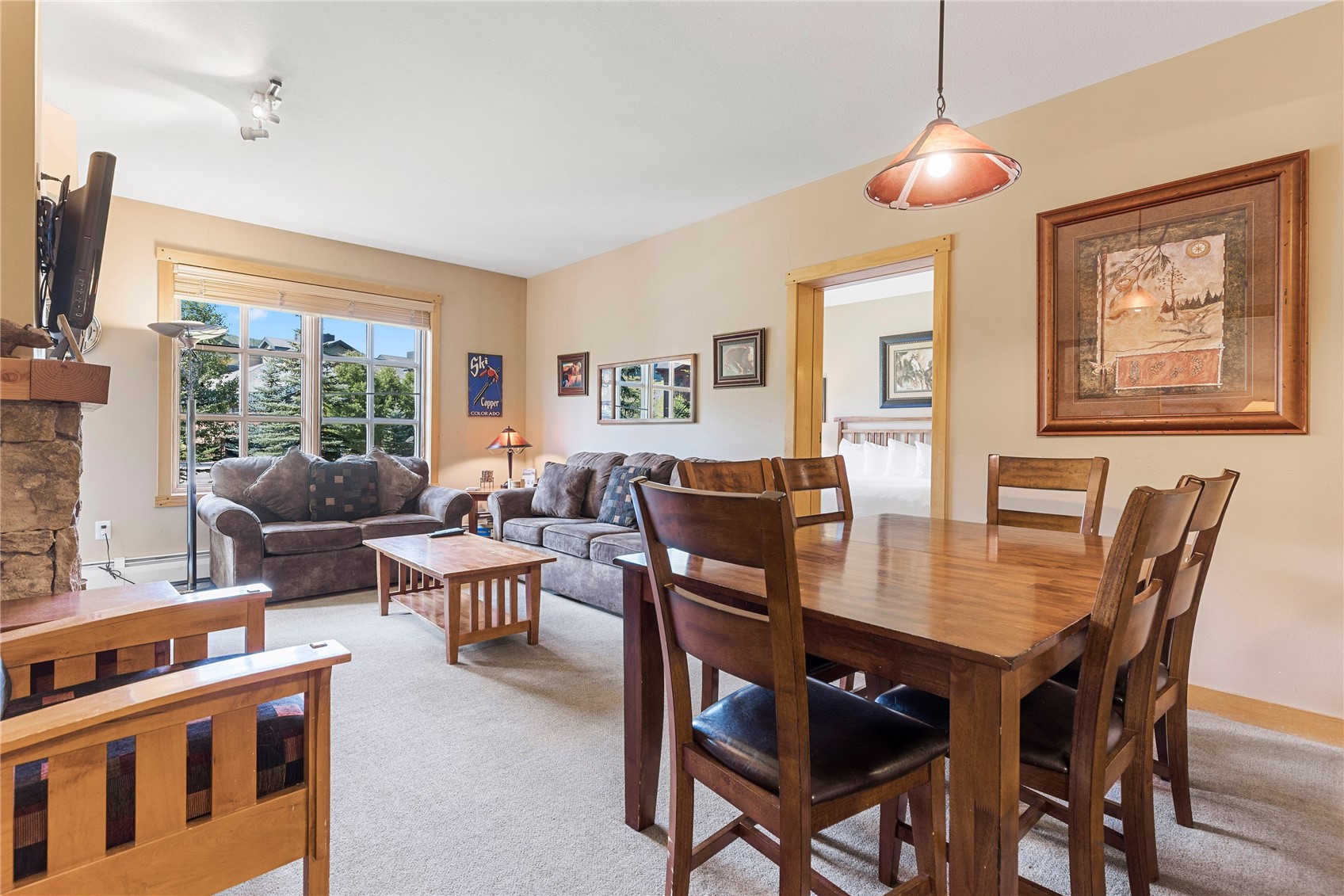 910 Copper Road, Unit 219 Copper Mountain, CO 80443 - Photo 5 of 35 a view of a dining room with furniture window and outside view