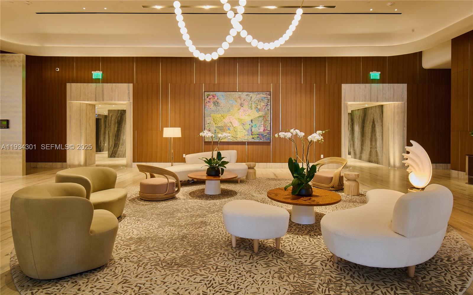 500 Alton Road, Unit 1602 Miami Beach, FL 33139 - Photo 15 of 33 a living room with furniture a lamp and a large window