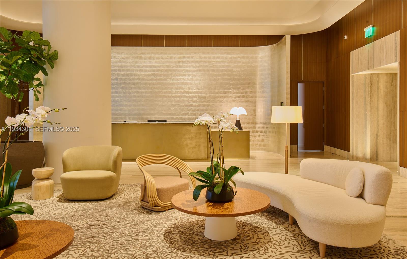 500 Alton Road, Unit 1602 Miami Beach, FL 33139 - Photo 16 of 33 a living room with furniture and a potted plant