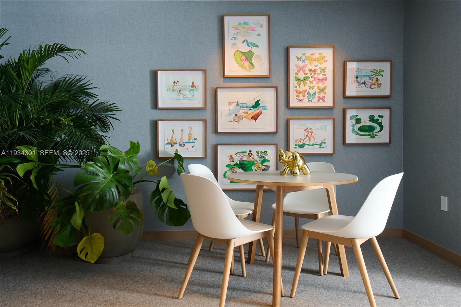500 Alton Road, Unit 1602 Miami Beach, FL 33139 - Photo 17 of 33 a dining room with furniture and a potted plant