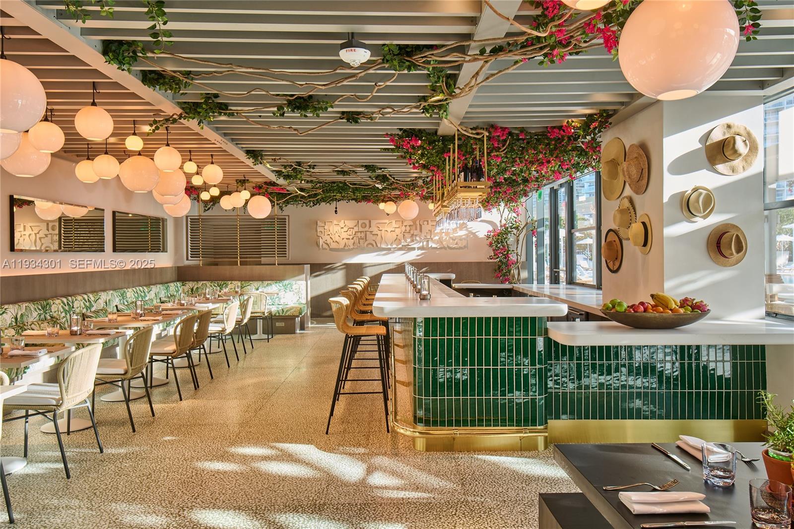 500 Alton Road, Unit 1602 Miami Beach, FL 33139 - Photo 28 of 33 a view of a chairs and a tables in the patio