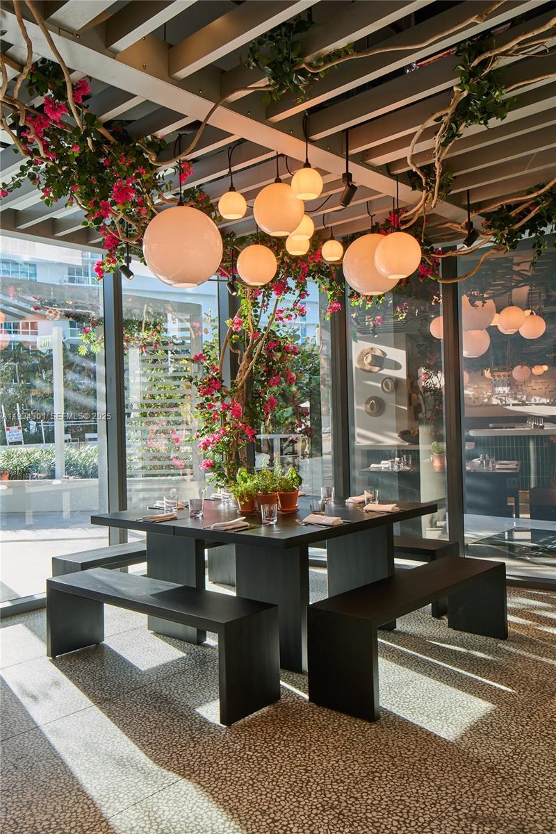 500 Alton Road, Unit 1602 Miami Beach, FL 33139 - Photo 29 of 33 a living room filled with furniture and a table