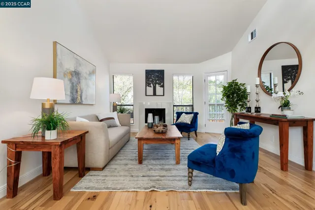 a kitchen with stainless steel appliances a stove a microwave and cabinets