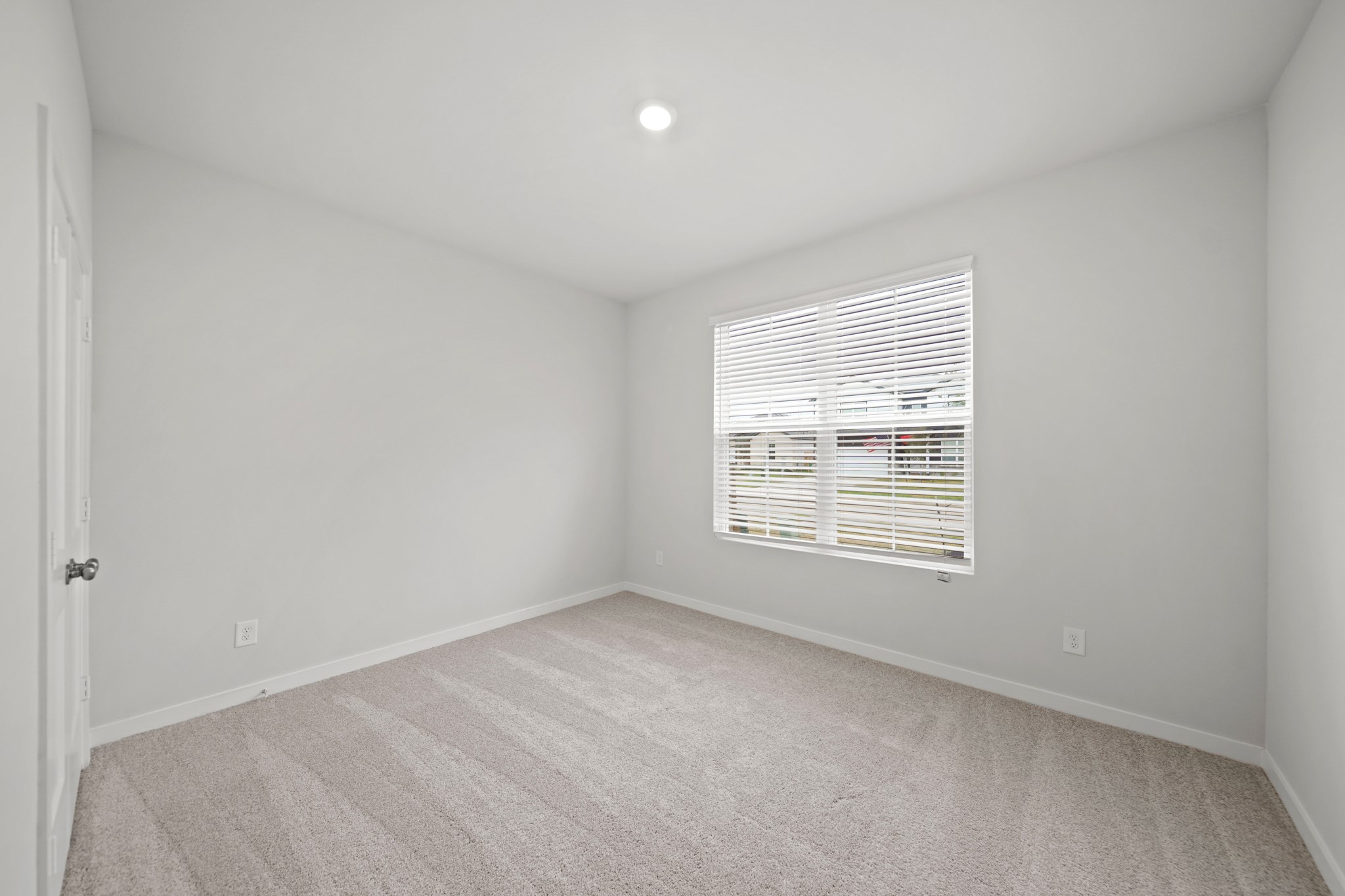 149 Byu Bnd Boulevard Angleton, TX 77515 - Photo 12 of 24 a view of an empty room with a window