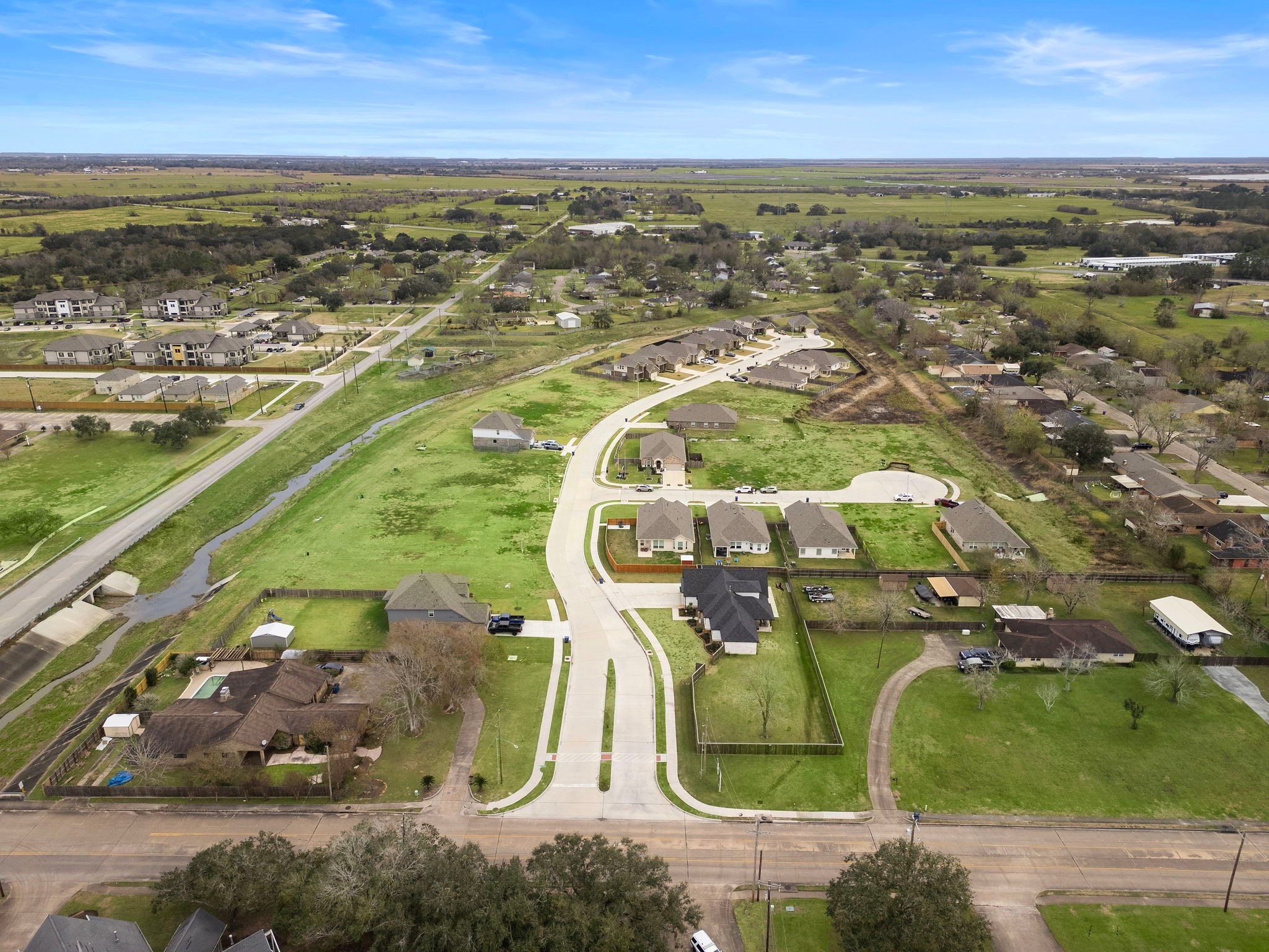 149 Byu Bnd Boulevard Angleton, TX 77515 - Photo 24 of 24 an aerial view of residential houses with outdoor space