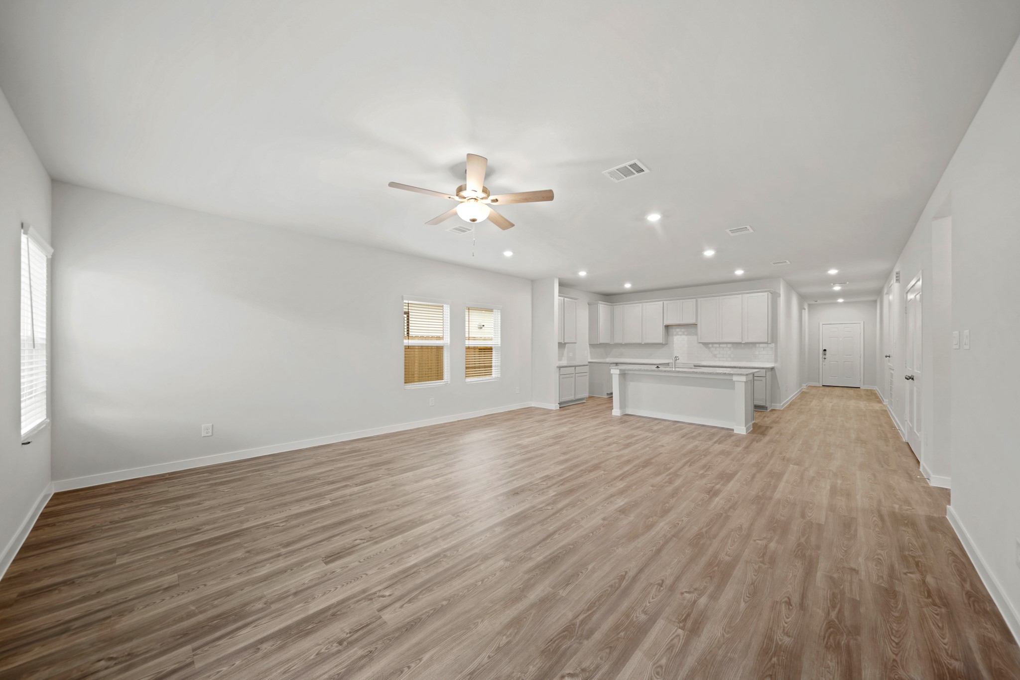 149 Byu Bnd Boulevard Angleton, TX 77515 - Photo 6 of 24 a view of a kitchen with a sink and a stove top oven