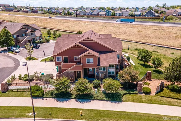 a aerial view of a house with a lake view