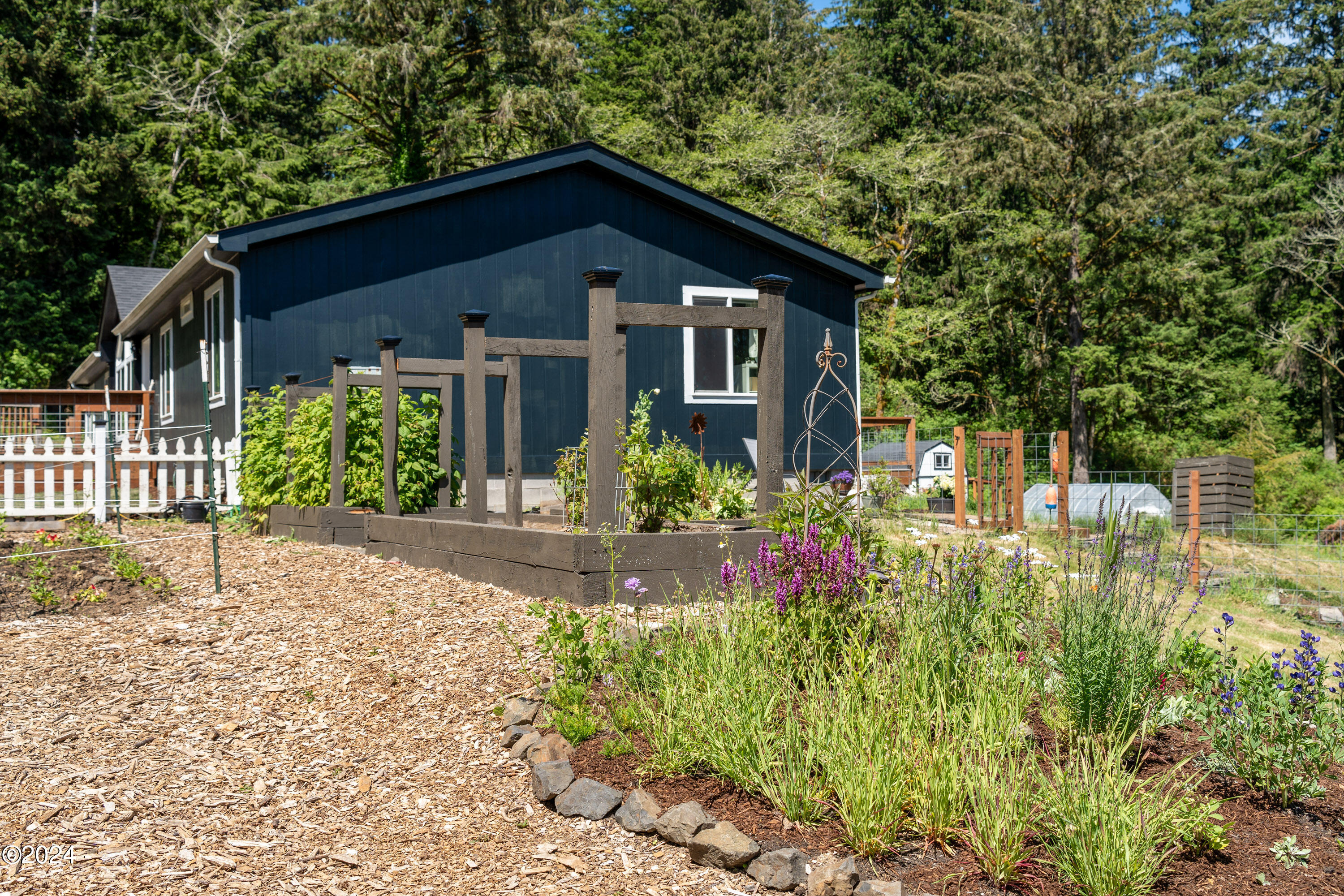 405 Southeast John Nye Road Newport, OR 97365 - Photo 53 of 54 Manicured Gardens