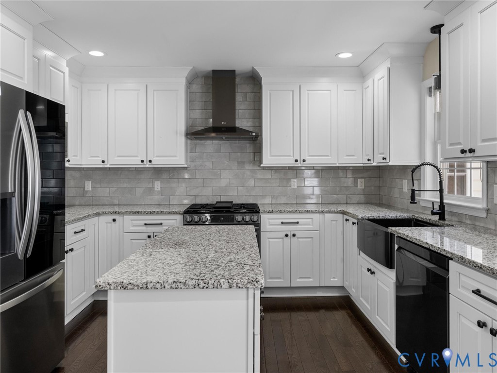 14012 Lippingham Terrace Chester, VA 23831 - Photo 14 of 50 a kitchen with stainless steel appliances granite countertop a sink stove and refrigerator