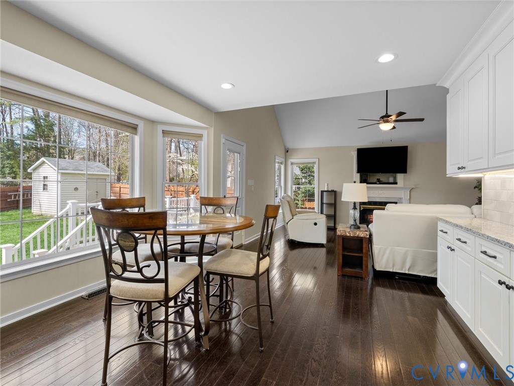 14012 Lippingham Terrace Chester, VA 23831 - Photo 19 of 50 a view of a dining room with furniture and wooden floor