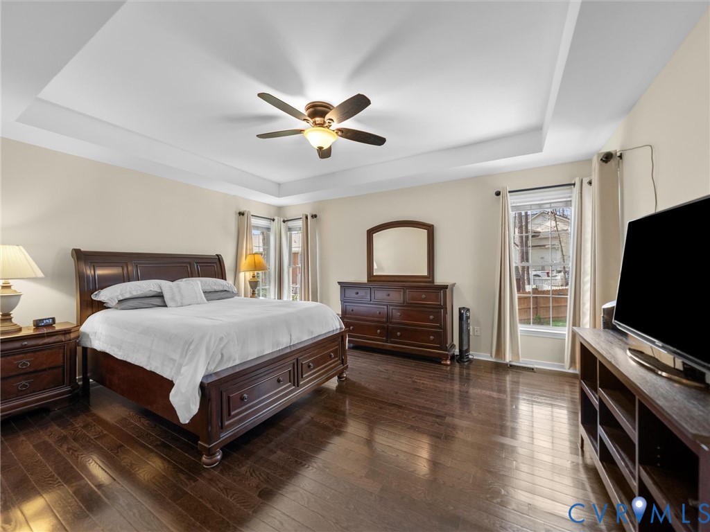 14012 Lippingham Terrace Chester, VA 23831 - Photo 25 of 50 a bedroom with a bed and a flat screen tv