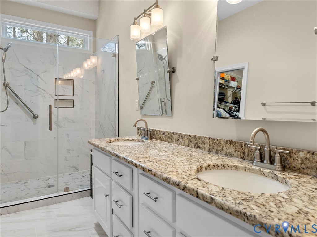 14012 Lippingham Terrace Chester, VA 23831 - Photo 27 of 50 a bathroom with a granite countertop sink mirror and double