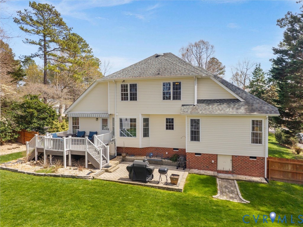 14012 Lippingham Terrace Chester, VA 23831 - Photo 47 of 50 a front view of a house with a yard table and chairs