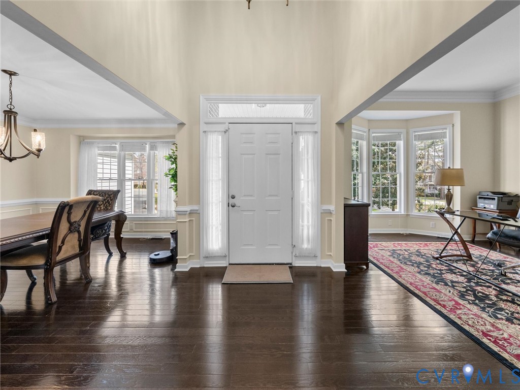 14012 Lippingham Terrace Chester, VA 23831 - Photo 6 of 50 a living room with furniture wooden floor and a rug