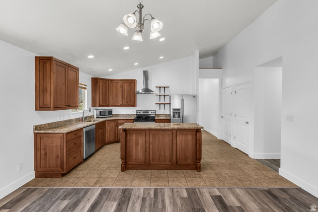 1836 West 800 North Mapleton, UT 84663 - Photo 7 of 38 Kitchen featuring wood cabinetry, an island with a stone-finish countertop, stainless steel appliances, and tile flooring