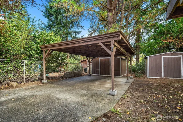 a view of a car parked in front of house