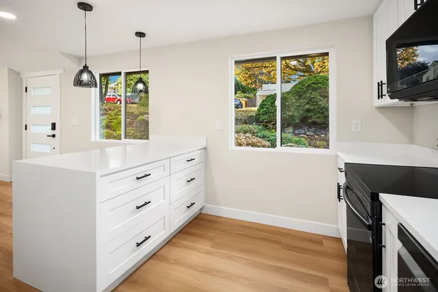 a room with a bed and a window