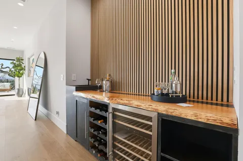 a workspace with furniture and mirror