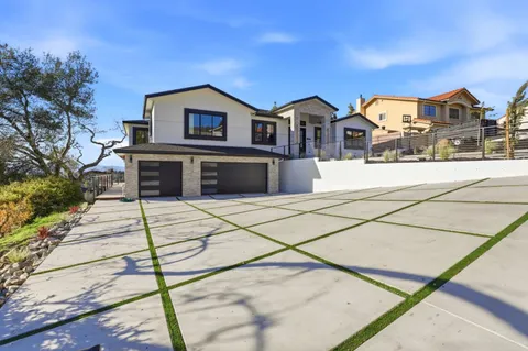 a house view with a outdoor space