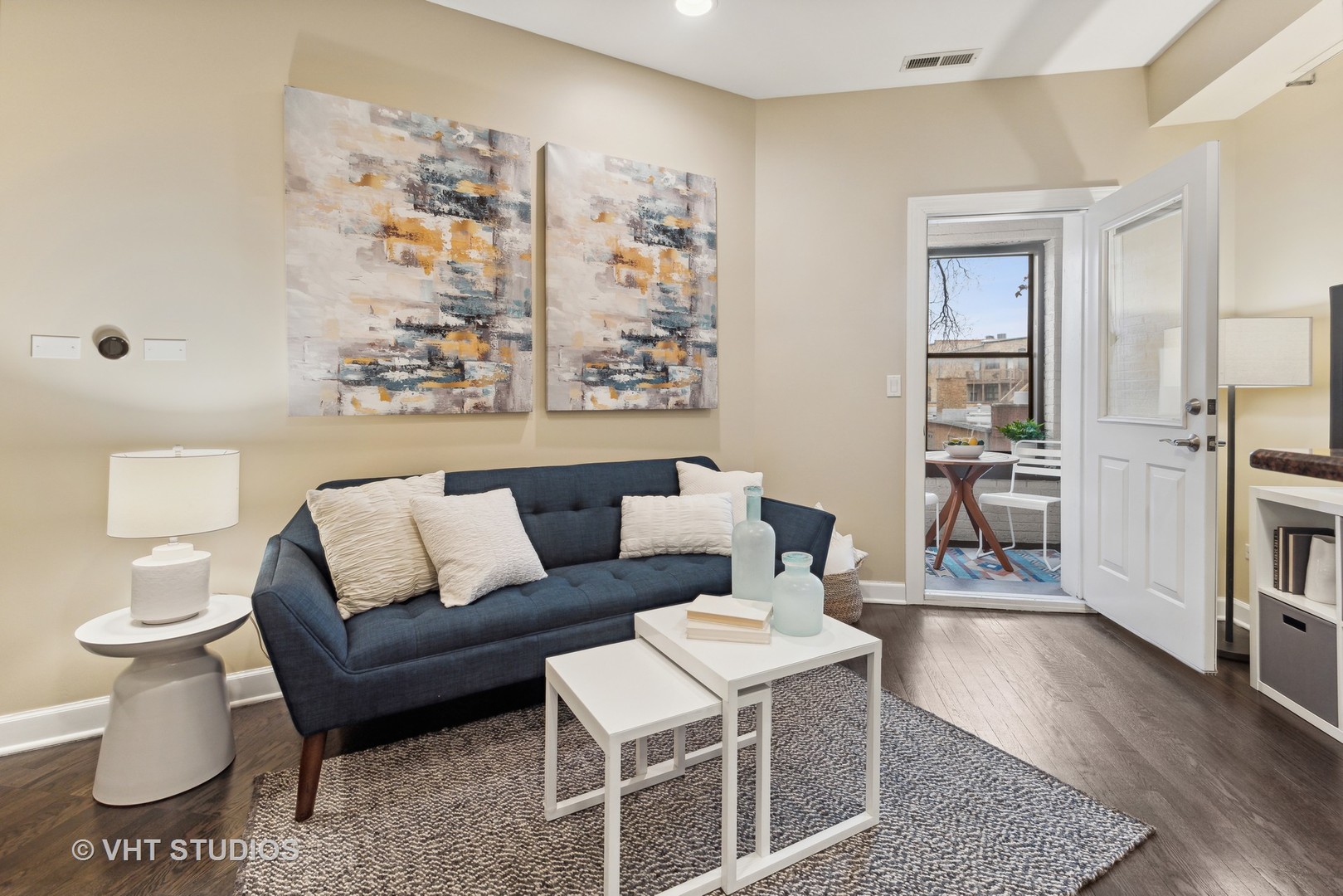 1902 West Byron Street, Unit 2 Chicago, IL 60613 - Photo 6 of 17 a living room with furniture and wooden floor