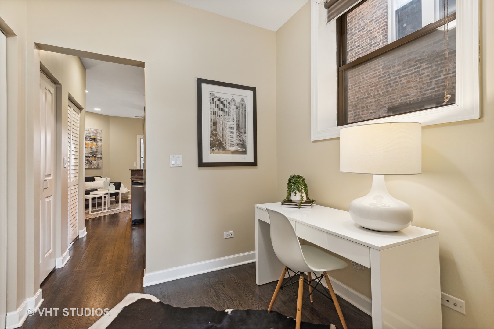 1902 West Byron Street, Unit 2 Chicago, IL 60613 - Photo 10 of 17 a dining room with furniture and wooden floor