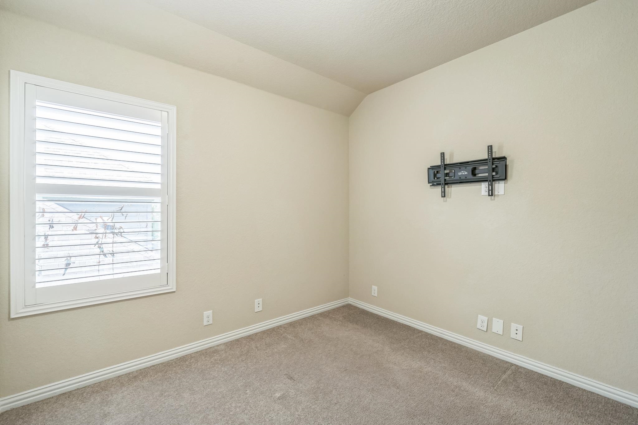12009 Vignette Schertz, TX 78154 - Photo 18 of 40 an empty room with a window