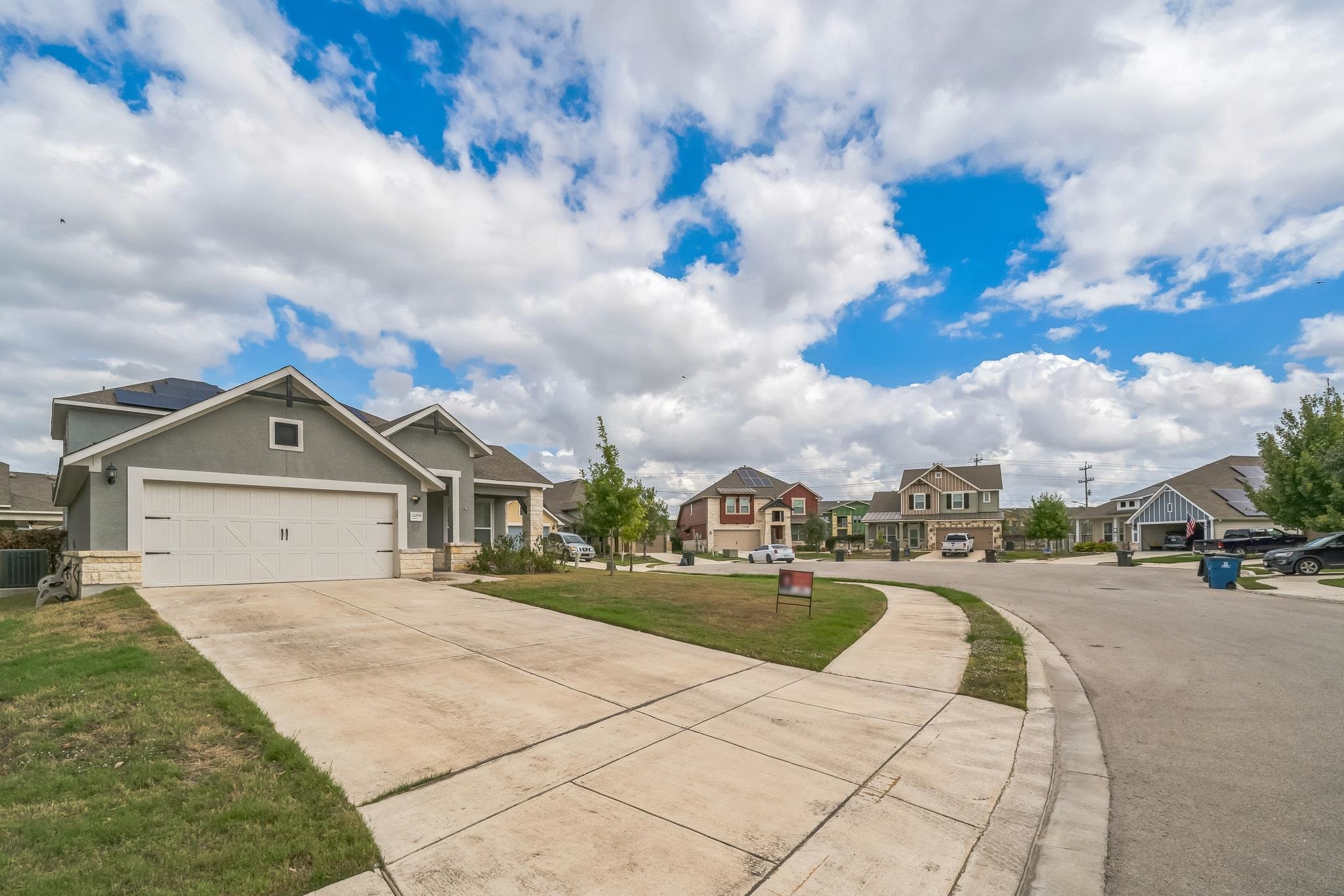 12009 Vignette Schertz, TX 78154 - Photo 2 of 40 a view of a house with a yard
