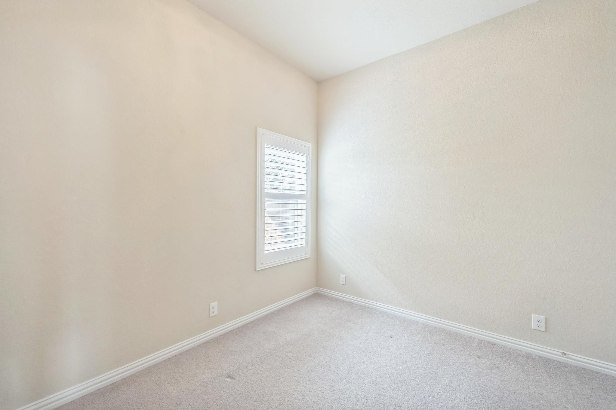 12009 Vignette Schertz, TX 78154 - Photo 28 of 40 a view of an empty room with a window