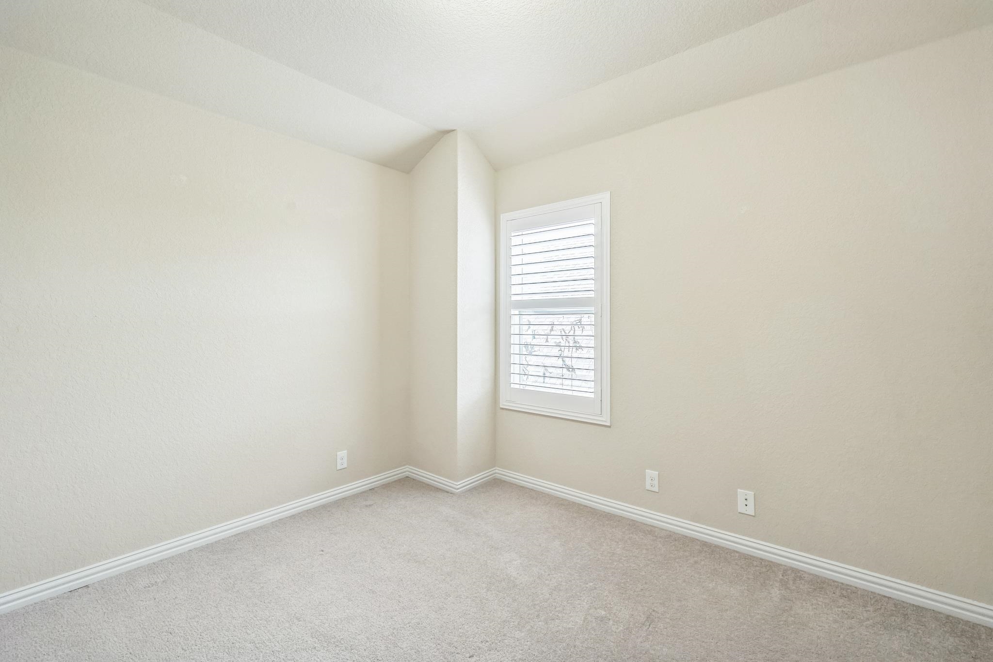 12009 Vignette Schertz, TX 78154 - Photo 31 of 40 an empty room with a window