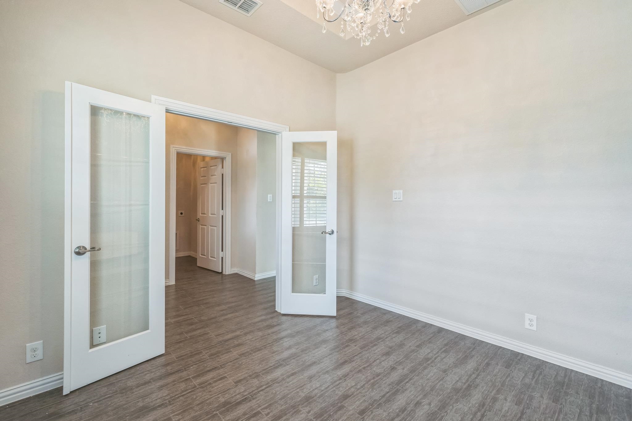 12009 Vignette Schertz, TX 78154 - Photo 7 of 40 a view of a room with wooden floor