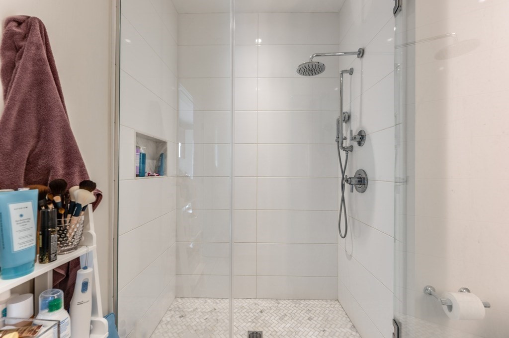 100 Shawmut, Unit 411 Boston, MA 02118 - Photo 6 of 15 a bathroom with a shower