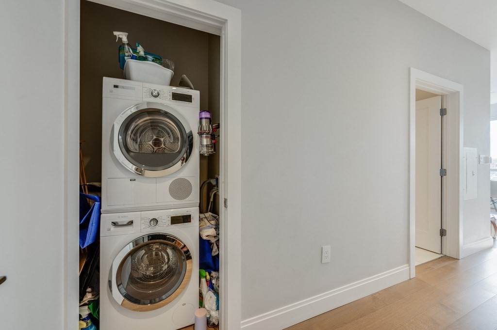100 Shawmut, Unit 411 Boston, MA 02118 - Photo 8 of 15 a utility room with dryer and washer