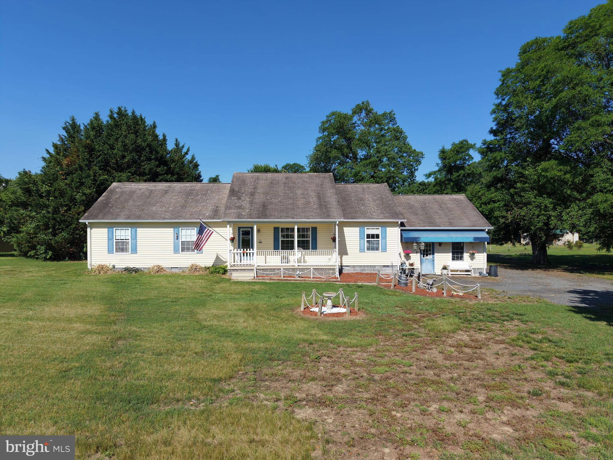 7112 East New Market Ellwood Road Hurlock, MD 21643 - Photo 38 of 41 front view of a house with a yard