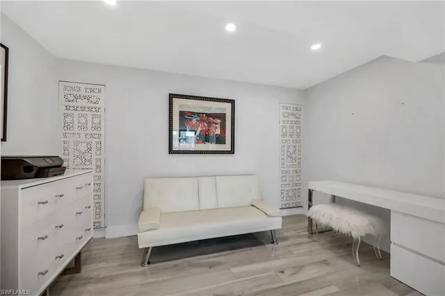 a bathroom with a bathtub and a sink