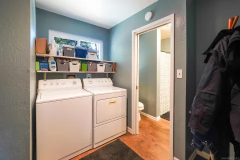 a utility room with dryer and washer