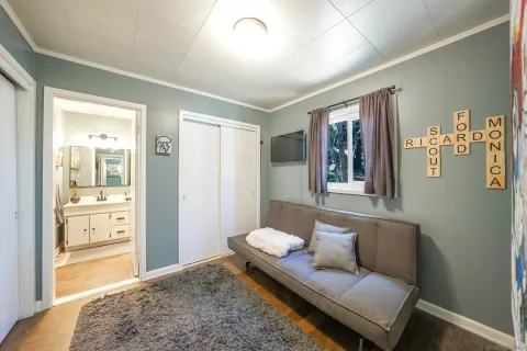a living room with furniture and window