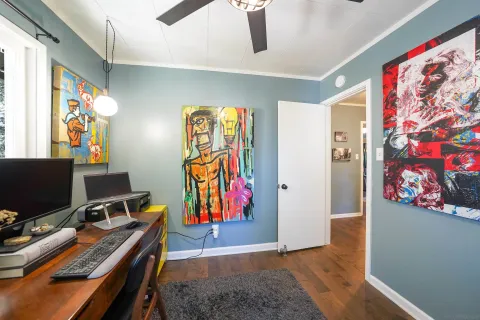 a view of a workspace with furniture and toys