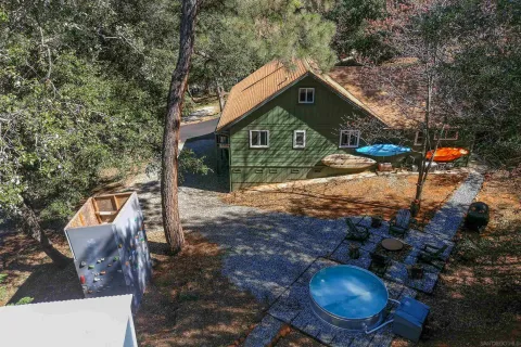 a view of backyard with green space