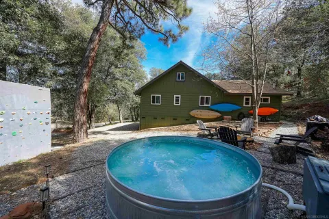 a view of a swimming pool with a patio