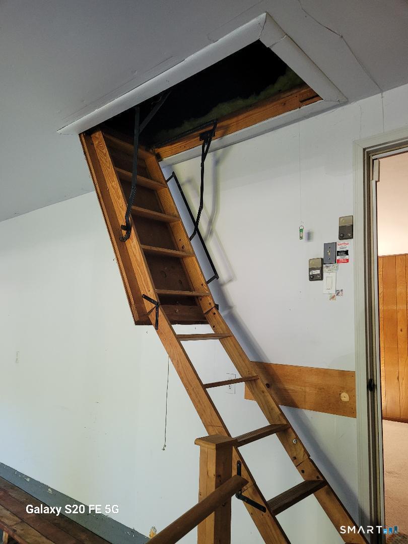 36 Park Road Colchester, CT 06415 - Photo 22 of 24 Drop down stairs to attic located in the Garage.