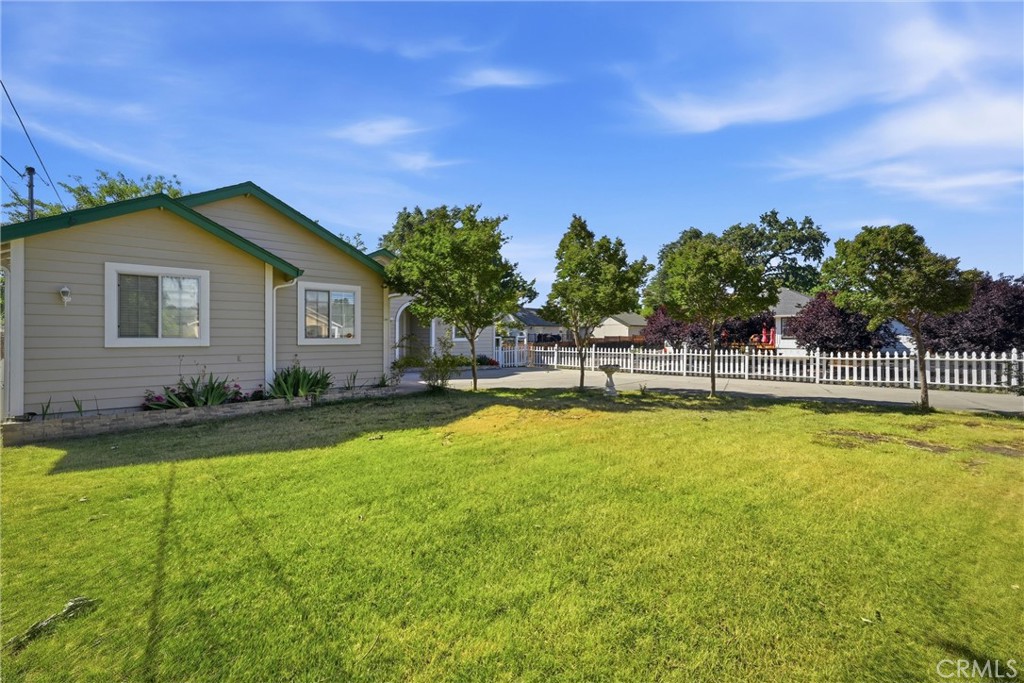 18846 Horseshoe Road Hidden Valley Lake, CA 95467 - Photo 31 of 31 a house view with swimming pool and trees in the background
